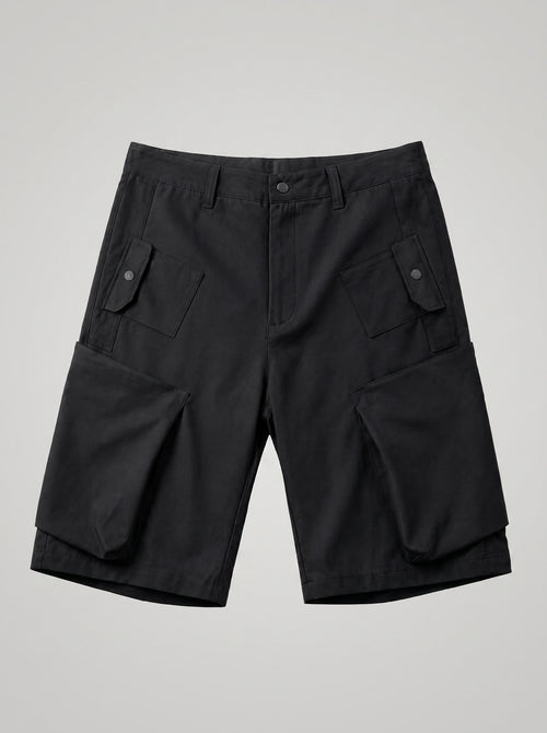 Black cargo shorts on a light gray background