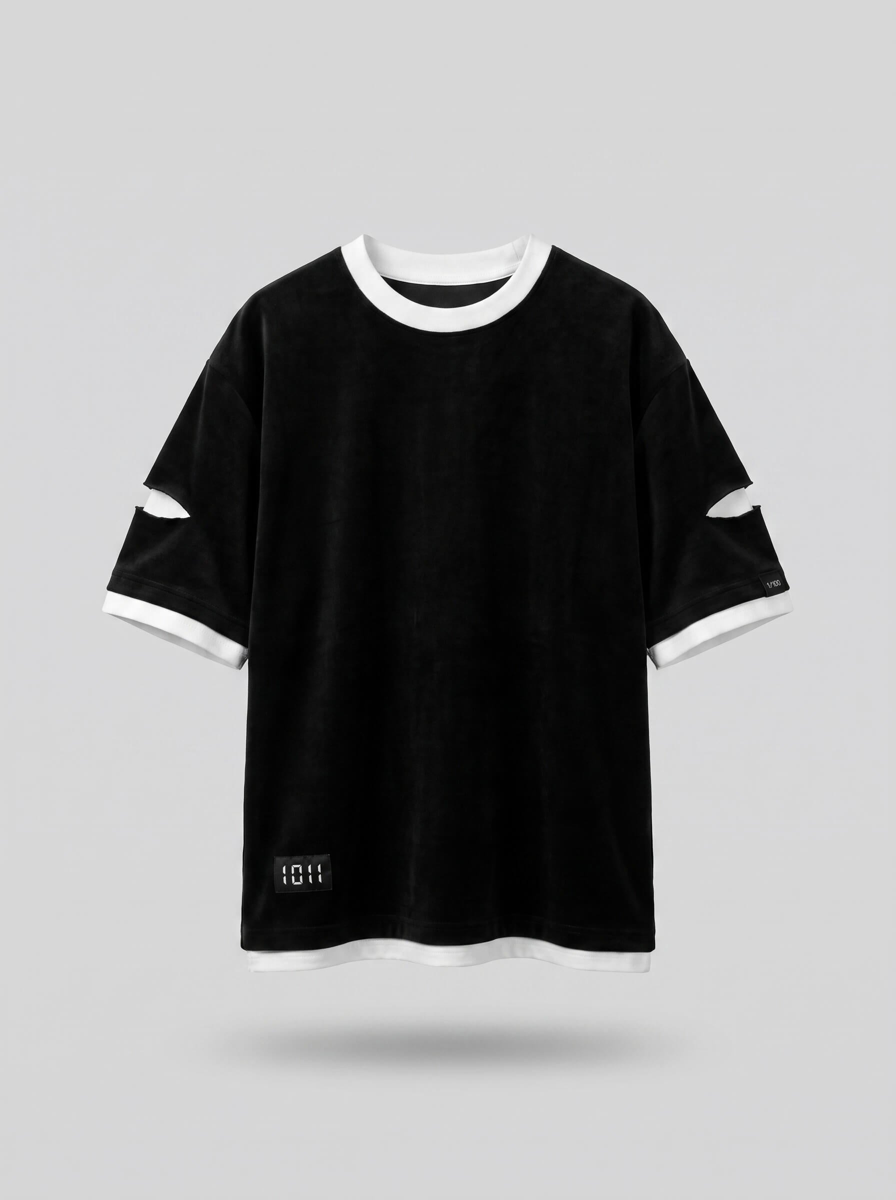 Black t-shirt with white trim on a light gray background